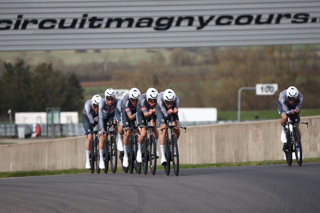 Alpecin-Deceuninck's riders cycle during the 3rd stage of the Paris-Nice cycling race, a 28,4 km team time trial between Nevers Magny-Cours Circuit and Nevers, on March 11, 2025. (Photo by Anne-Christine POUJOULAT / AFP)