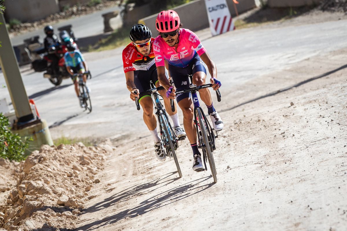 Lachlan Morton (EF Education First) and Hayden McCormick (Team Bridgelane) hit the dirt