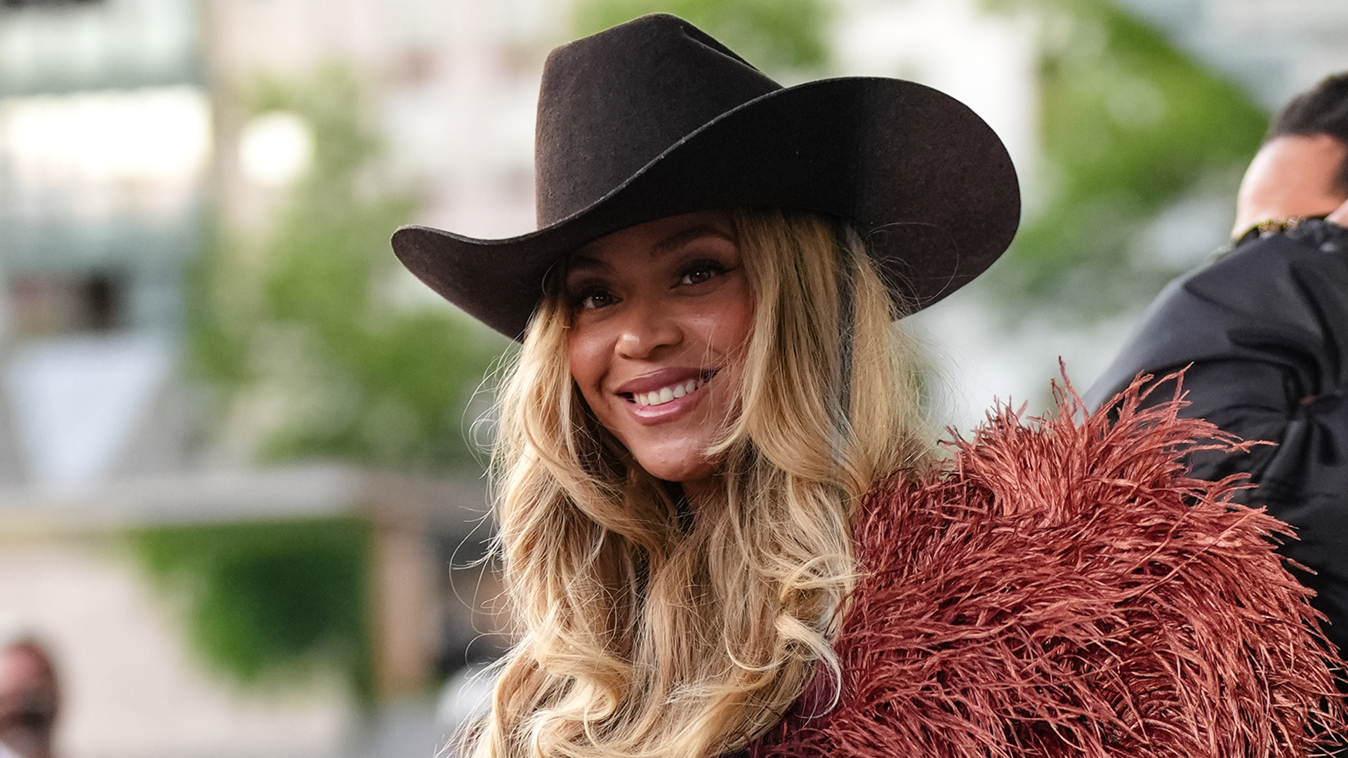 Beyoncé makes a surprise appearance at the Louis Vuitton Spring 2026 men's show in a denim jumpsuit