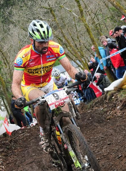 Jose Antonio Hermida Ramos (Multivan Merida) rides some muddly doubletrack.