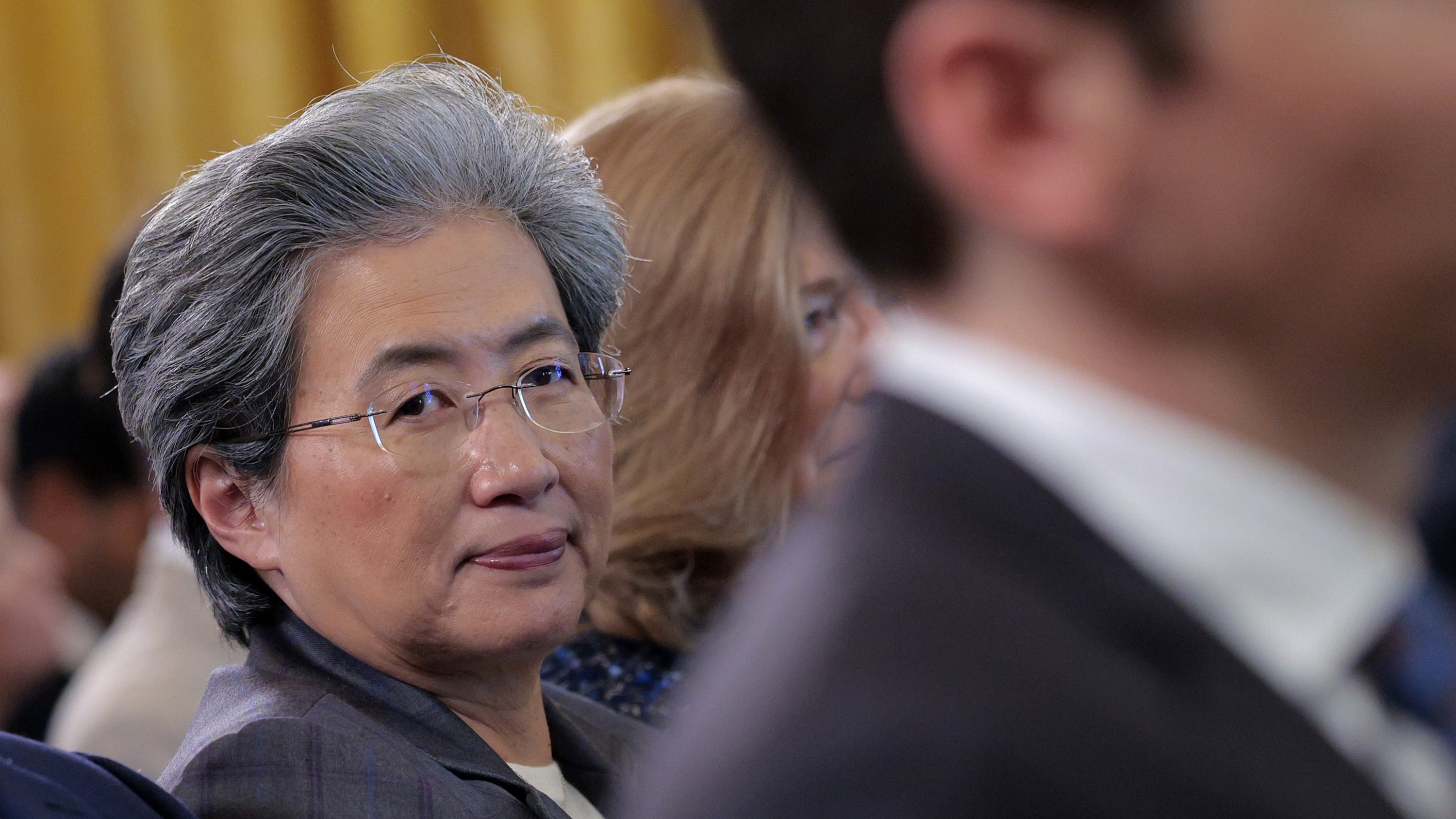 Advanced Micro Devices CEO Lisa Su (C) attends a meeting of the White House Task Force on Artificial Intelligence Education in the East Room of the White House on September 04, 2025 in Washington, DC.
