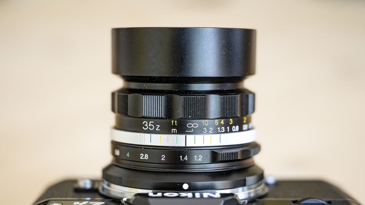 Voigtlander D 35mm f1.2 Nokton lens on a wooden table