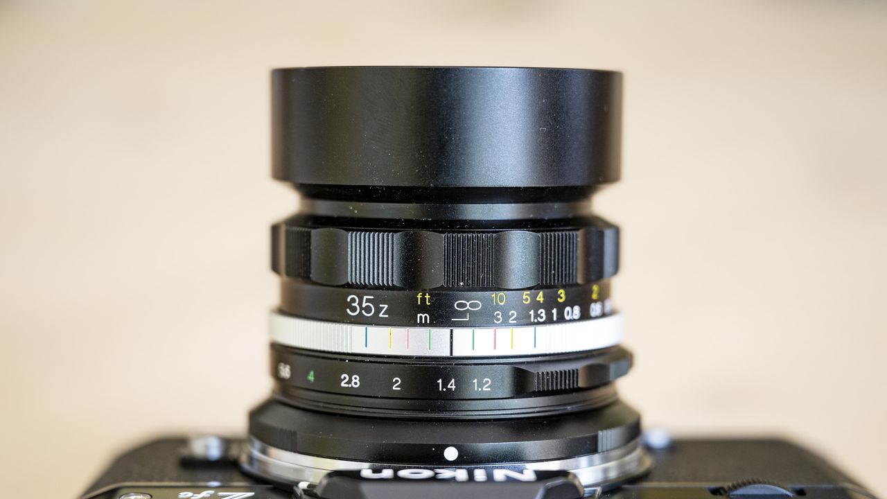 Voigtlander D 35mm f1.2 Nokton lens on a wooden table