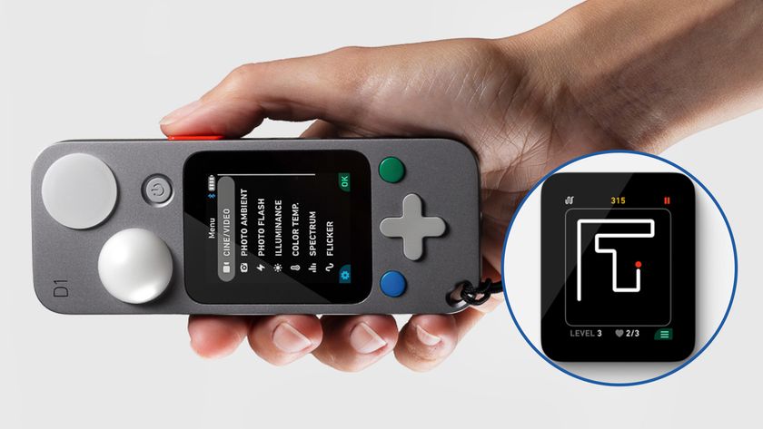 Hand holding Lit Systems Lit Duo 1 light meter 