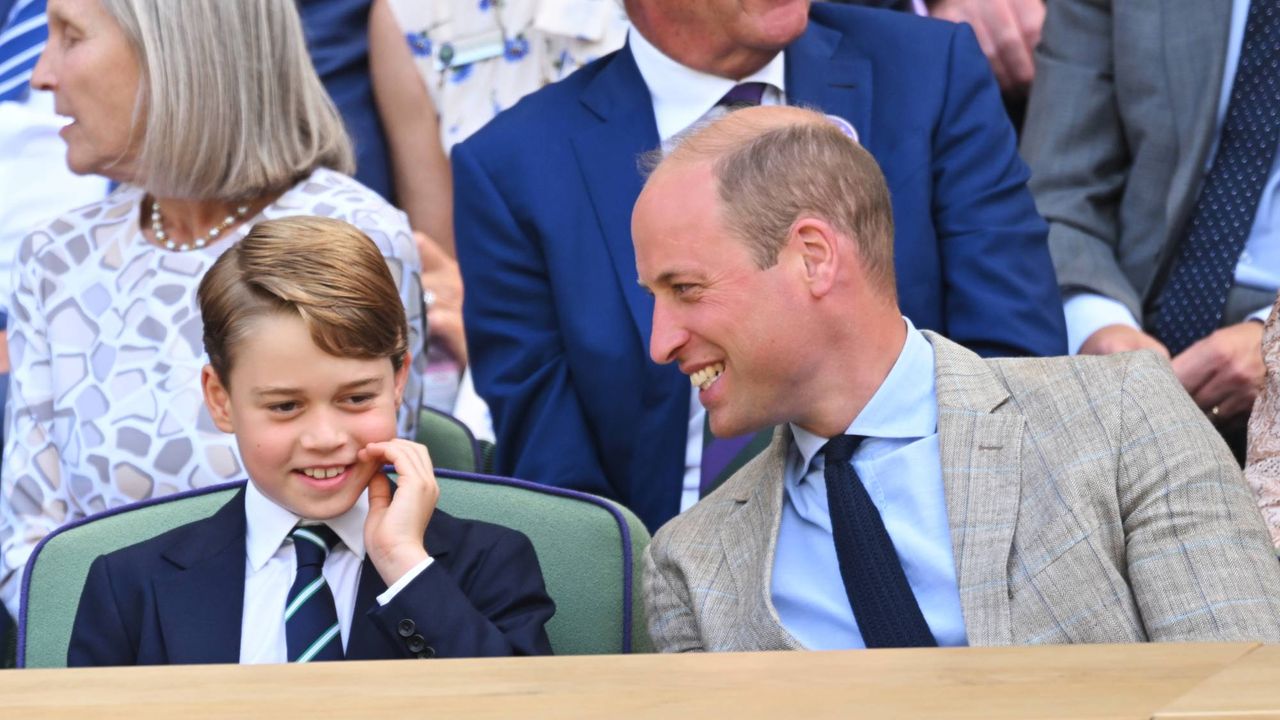 Prince George Prince William holding hands