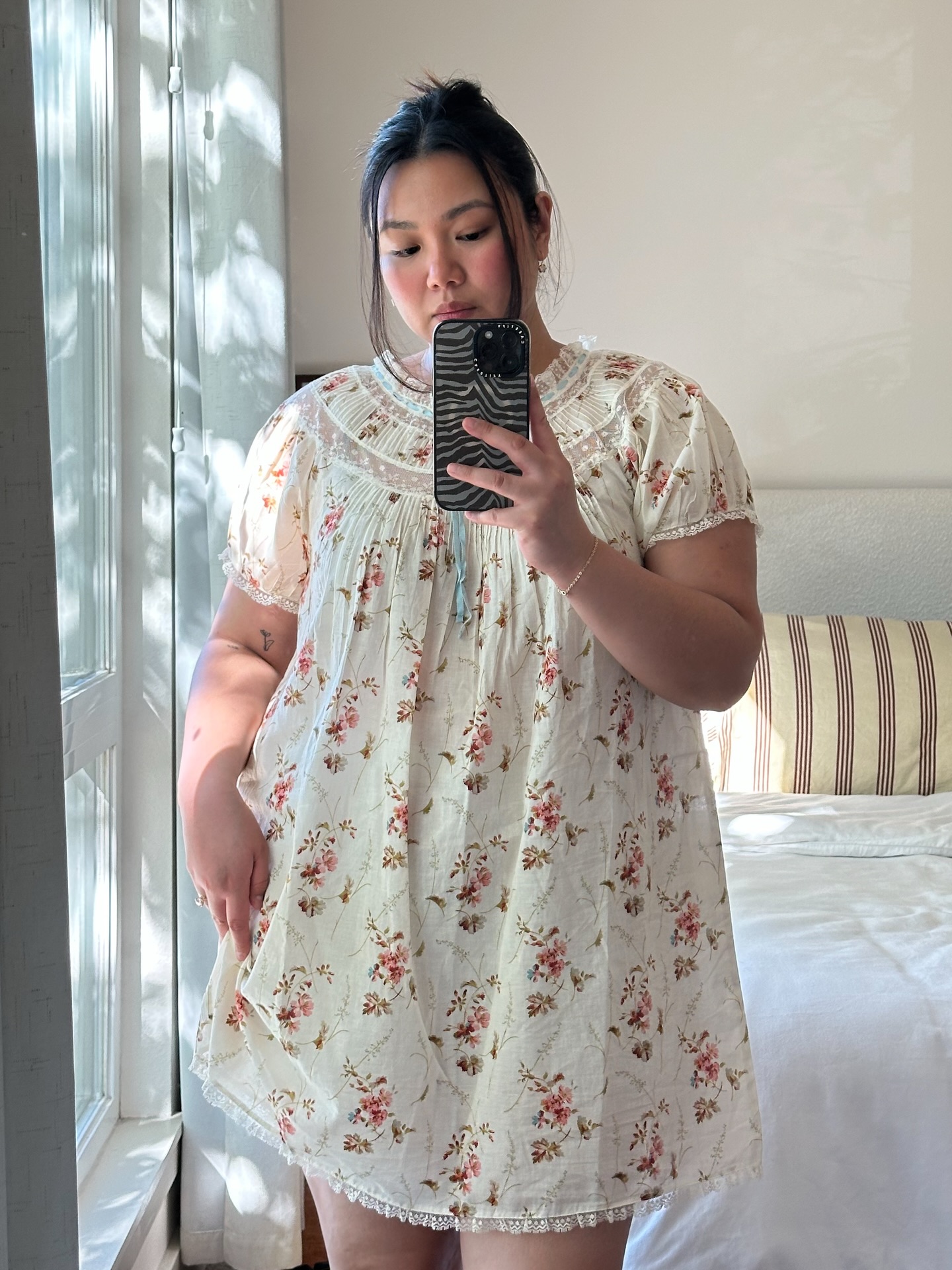 An image of @marina_torres wearing the Doen Daphne dress.