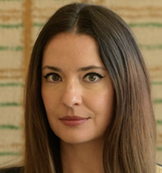 a white woman with brown hair wearing rose lipstick