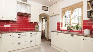 Country kitchen with red tiles