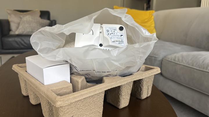 The Lumie Bodyclock 700FM Luxe sunrise alarm clock still in its packaging.  