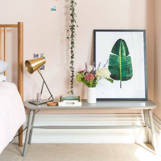 bedroom with bed side table and bed lamp