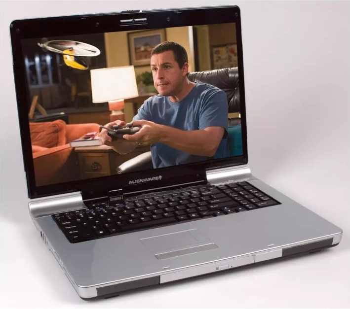 a 2007 Alienware M9700 laptop with Adam Sandler on the screen