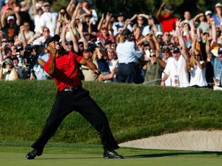 SAN DIEGO - JUNE 15: Tiger Woods reacts to his birdie putt on the 18th green to force a playoff with Rocco Mediate during the final round of the 108th U.S. Open at the Torrey Pines Golf Course (South Course) on June 15, 2008 in San Diego, California. (Photo by Jeff Gross/Getty Images)