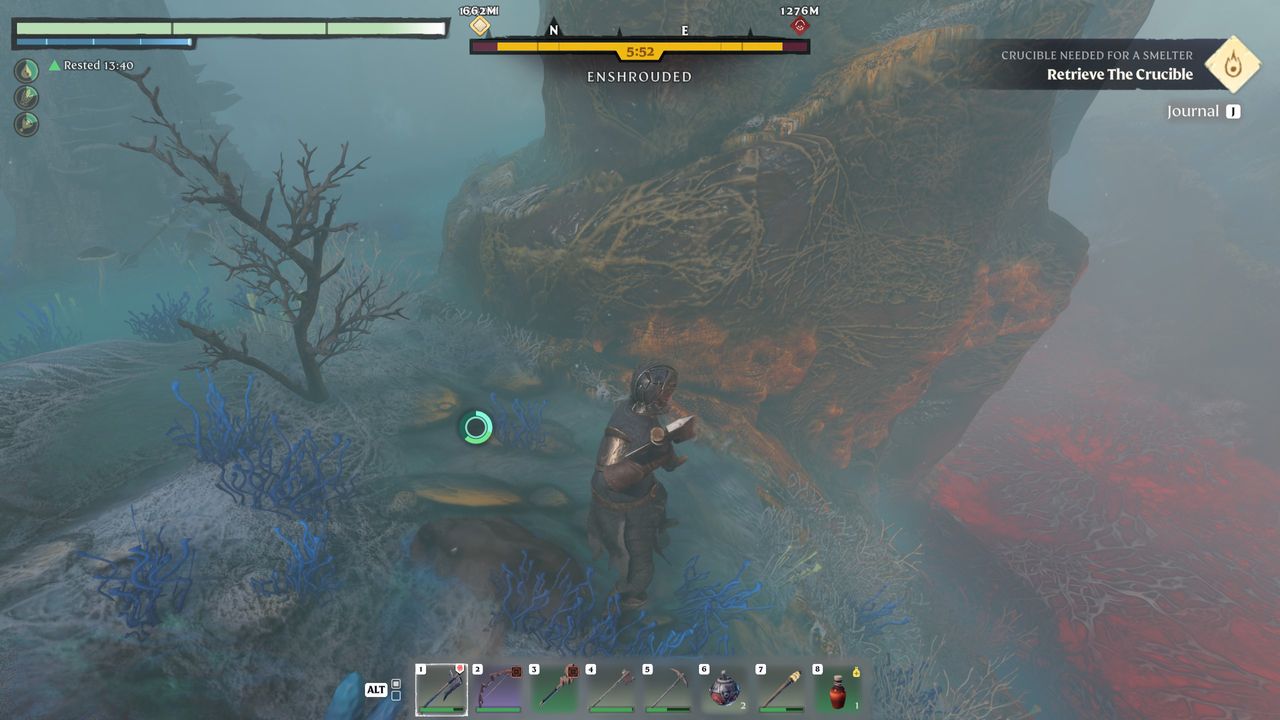 A fantasy character near a boulder