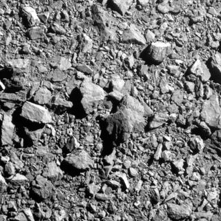 a pile of grey rocks and dust