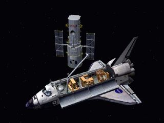Shuttle Astronauts Close in on Hubble Telescope