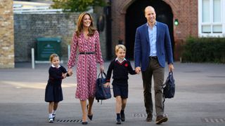 Princess Charlotte of Cambridge, accompanied by her father, Britain's Prince William, Duke of Cambridge, her mother, Britain's Catherine, Duchess of Cambridge and brother, Britain's Prince George of Cambridge, arrives for her first day of school at Thomas's Battersea in London on September 5, 2019.
