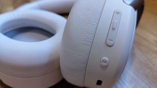 Edifier WH950NB review; a close up of buttons on headphones