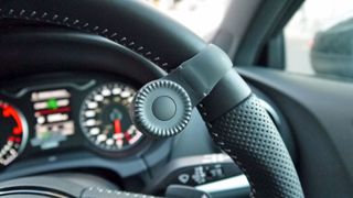 The Navdy Dial attaches to your steering wheel, making it easy to interact with the display
