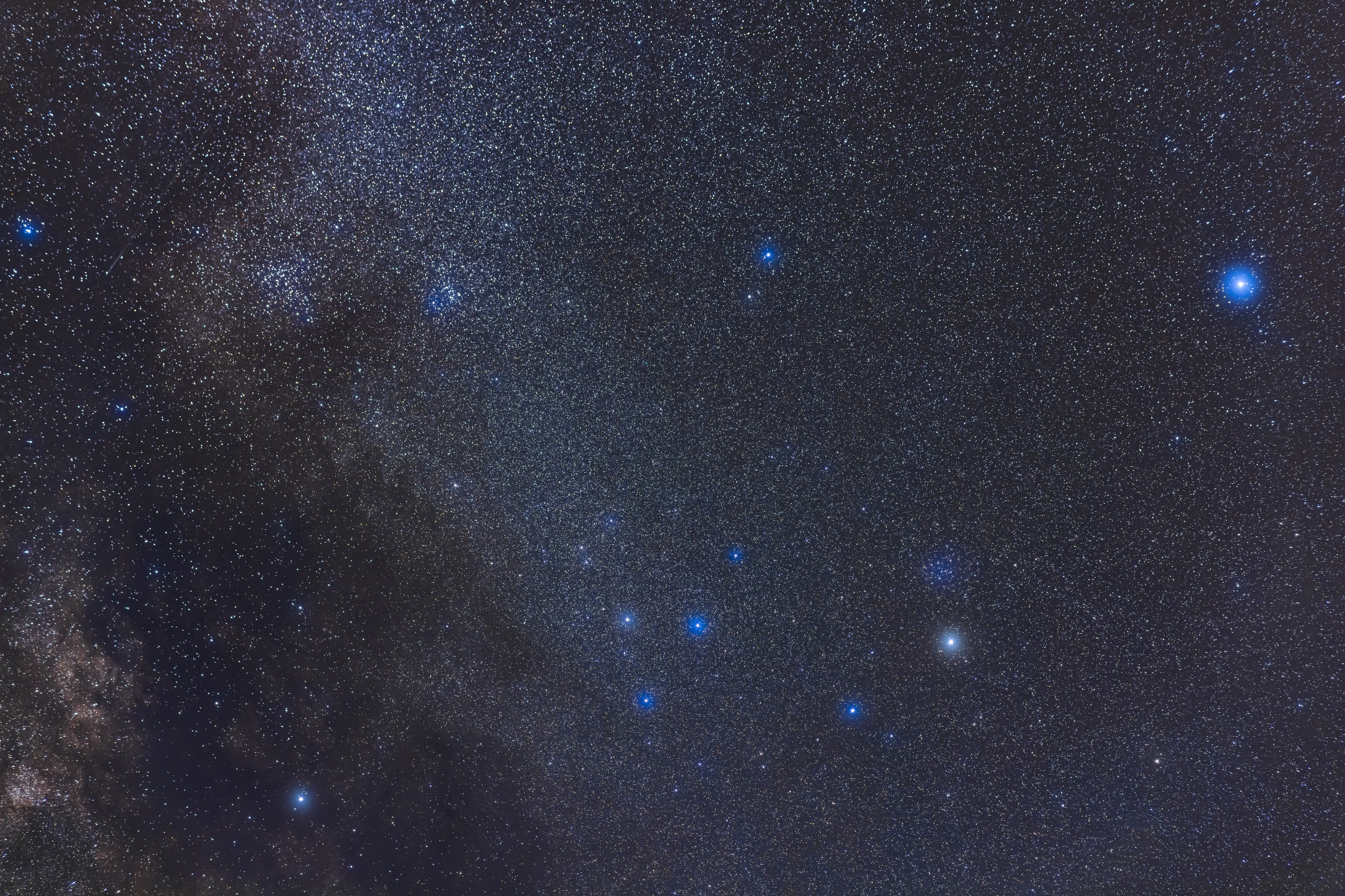 A framing of the group of large binocular-class star clusters in Serpens and Ophiuchus: notably, the pairing of IC 4756 (left) and NGC 6633 (right) at upper left, sometimes known as the S-O Double Cluster, or Tweedledum and Tweedledee (really!), and the cluster IC 4665 at right above the bright star Cebelrai, or Beta Ophiuchi. At centre is the V-shaped asterism known as Poniatowski's Bull, from a defunct constellation created in 1777 by polish astronomer Marcin Poczobut to honour the king of Poland at the time. The grouping is also catalogued as Melotte 186 and Collinder 359.