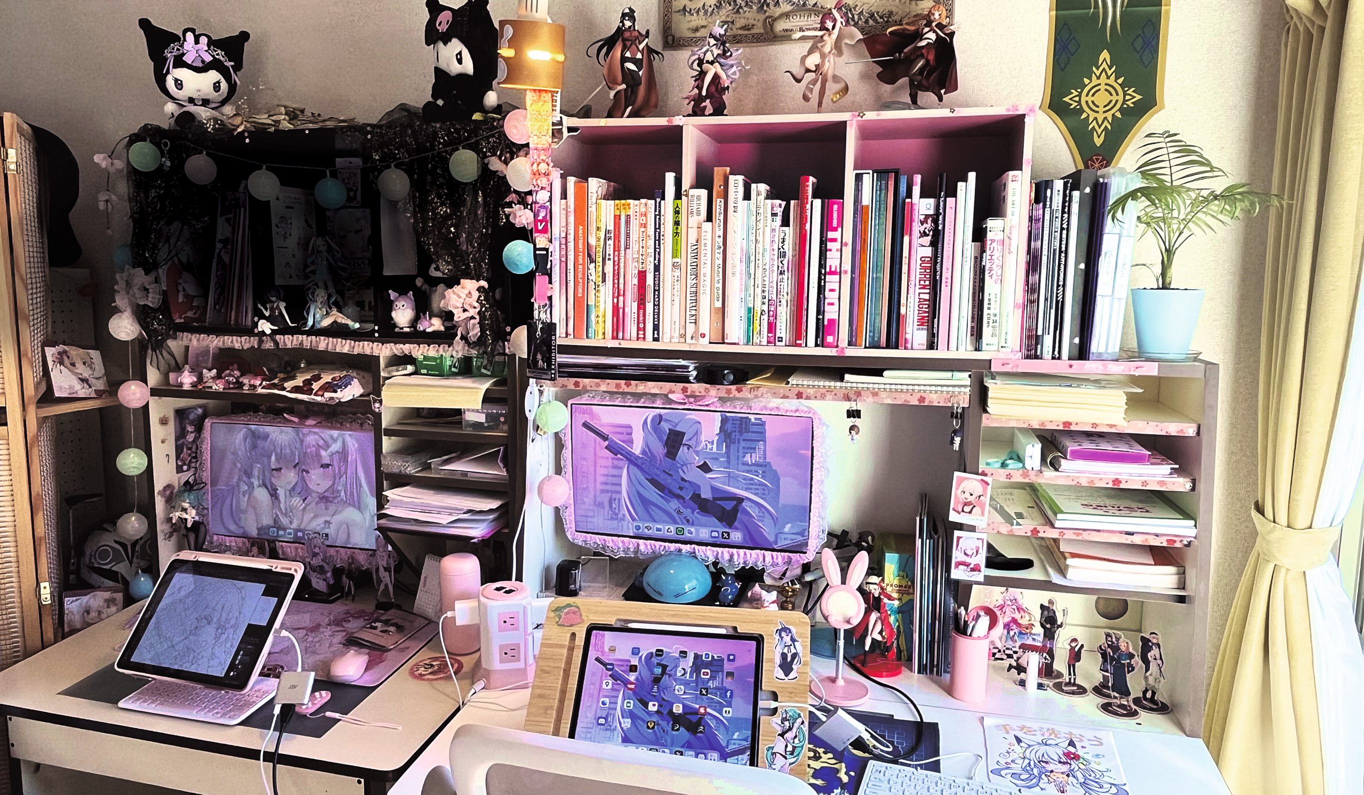 Artist's studio; an artist's workspace with bookshelf and computers