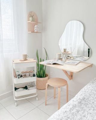 Light wooden vanity with mirror and stool