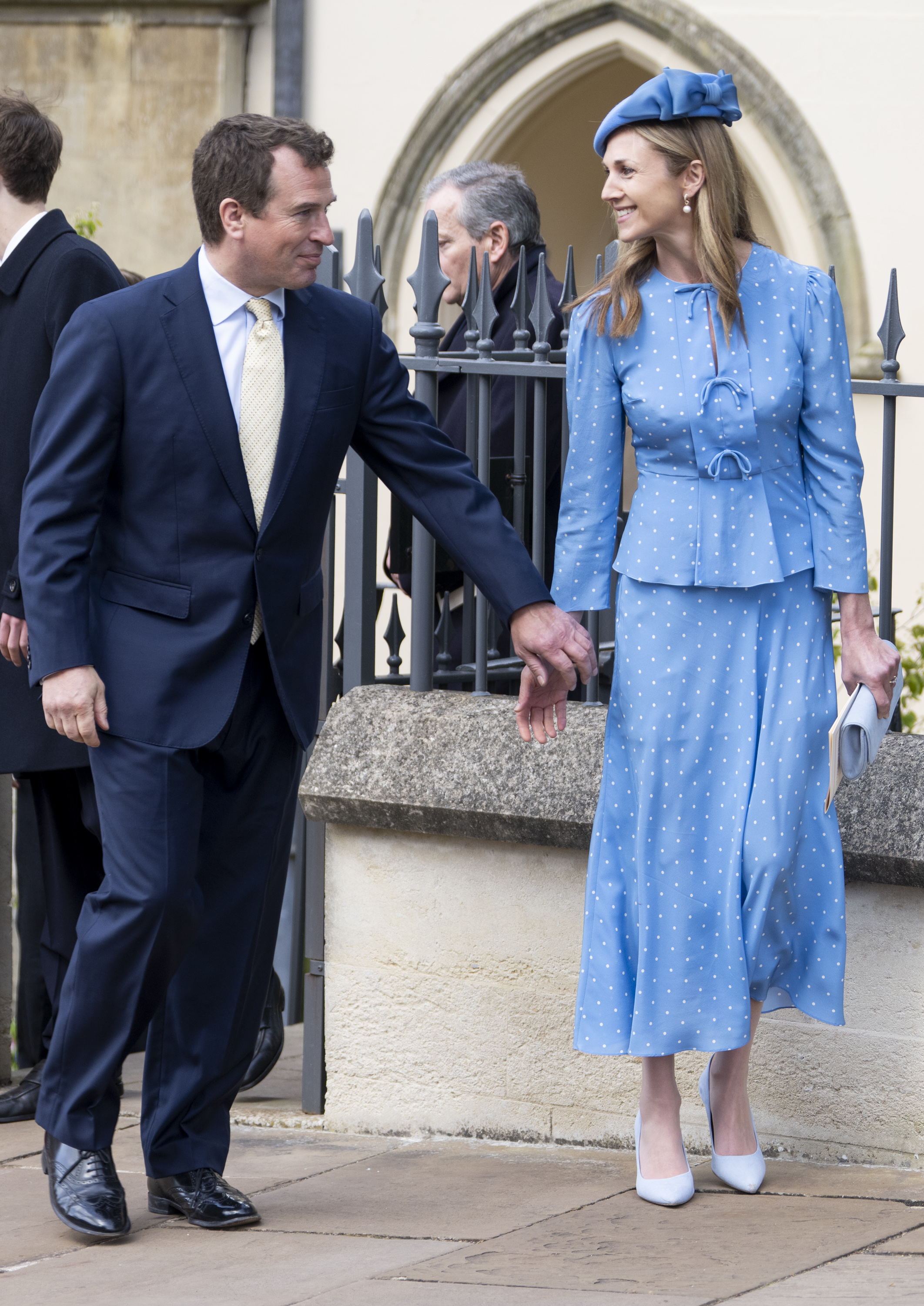 Peter Phillips holding hands with Harriet Sperling outside St George's Chapel on Easter