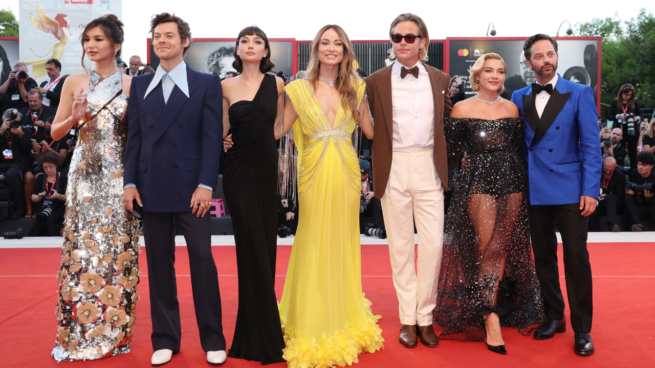 Gemma Chan, Harry Styles, Sydney Chandler, Olivia Wilde, Chris Pine, Florence Pugh and Nick Kroll attend the "Don't Worry Darling" red carpet at the 79th Venice International Film Festival