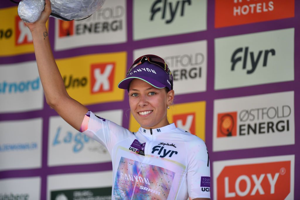 SARPSBORG NORWAY AUGUST 11 Shari Bossuyt of Belgium and Team CanyonSRAM Racing celebrates at podium as White Best Young Jersey winner during the 8th Tour of Scandinavia 2022 Battle Of The North Stage 3 a 1189km stage from Moss to Sarpsborg UCIWWT tourofscandinavia TOSC22 on August 11 2022 in Sarpsborg Norway Photo by Luc ClaessenGetty Images