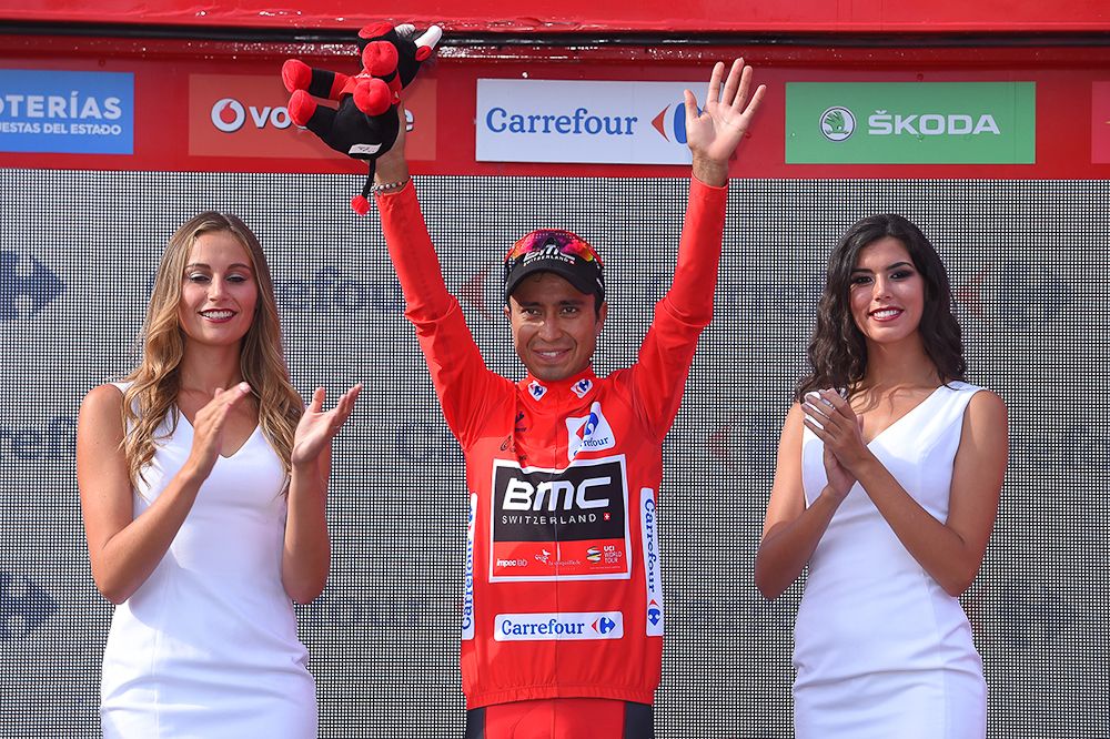 Darwin Atapuma in the race leader's jersey in the Vuelta's stage 7 podium.