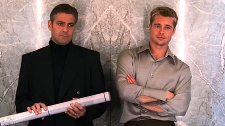 George Clooney and Brad Pitt are shown in Ocean's Eleven.