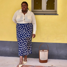 Abi marvel wears polka dot skirt yellow cardigan