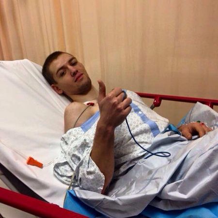 Arnold Fiek gives the thumbs up to show he's okay