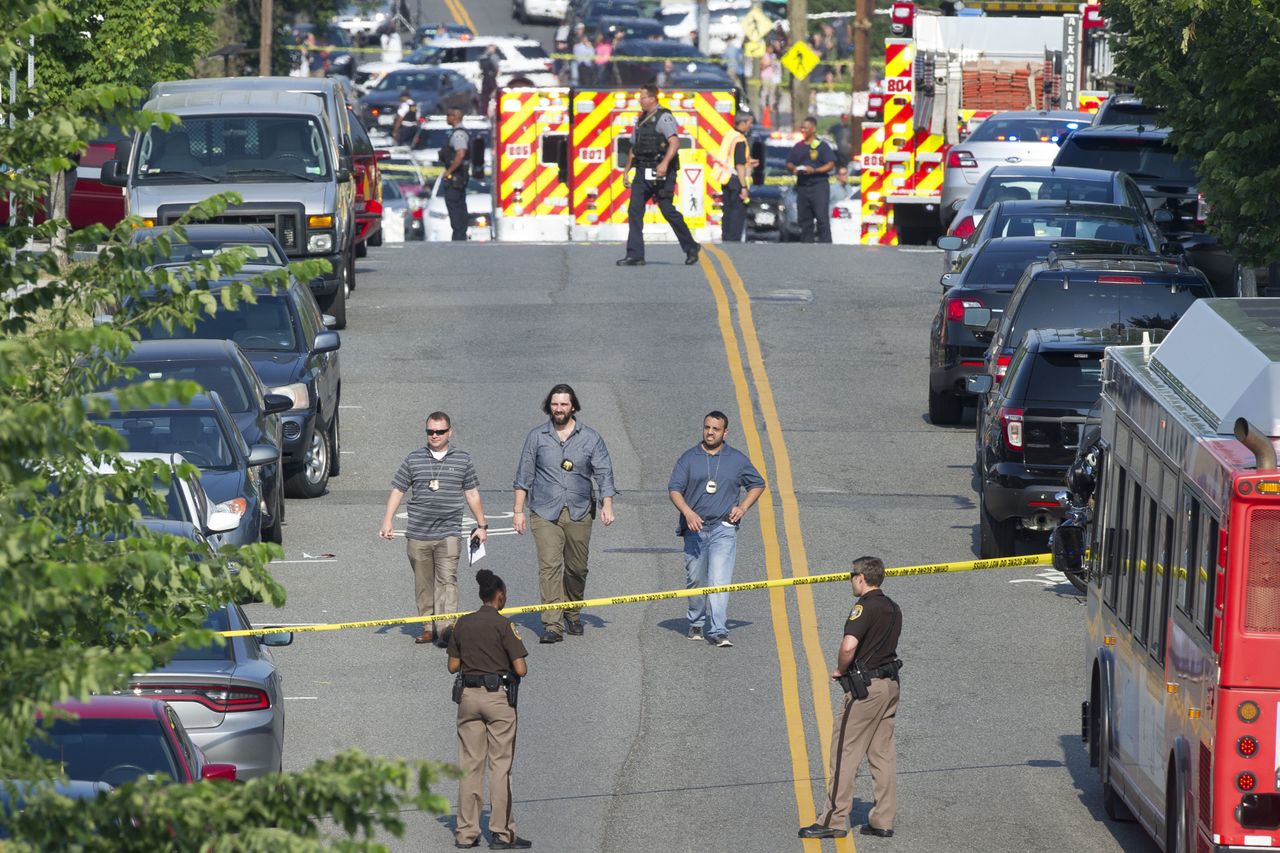 Officers at the scene of the shooting.