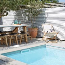 Pool with deck chair