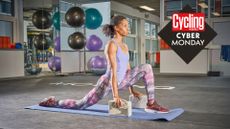  Lady practicing yoga in a gym