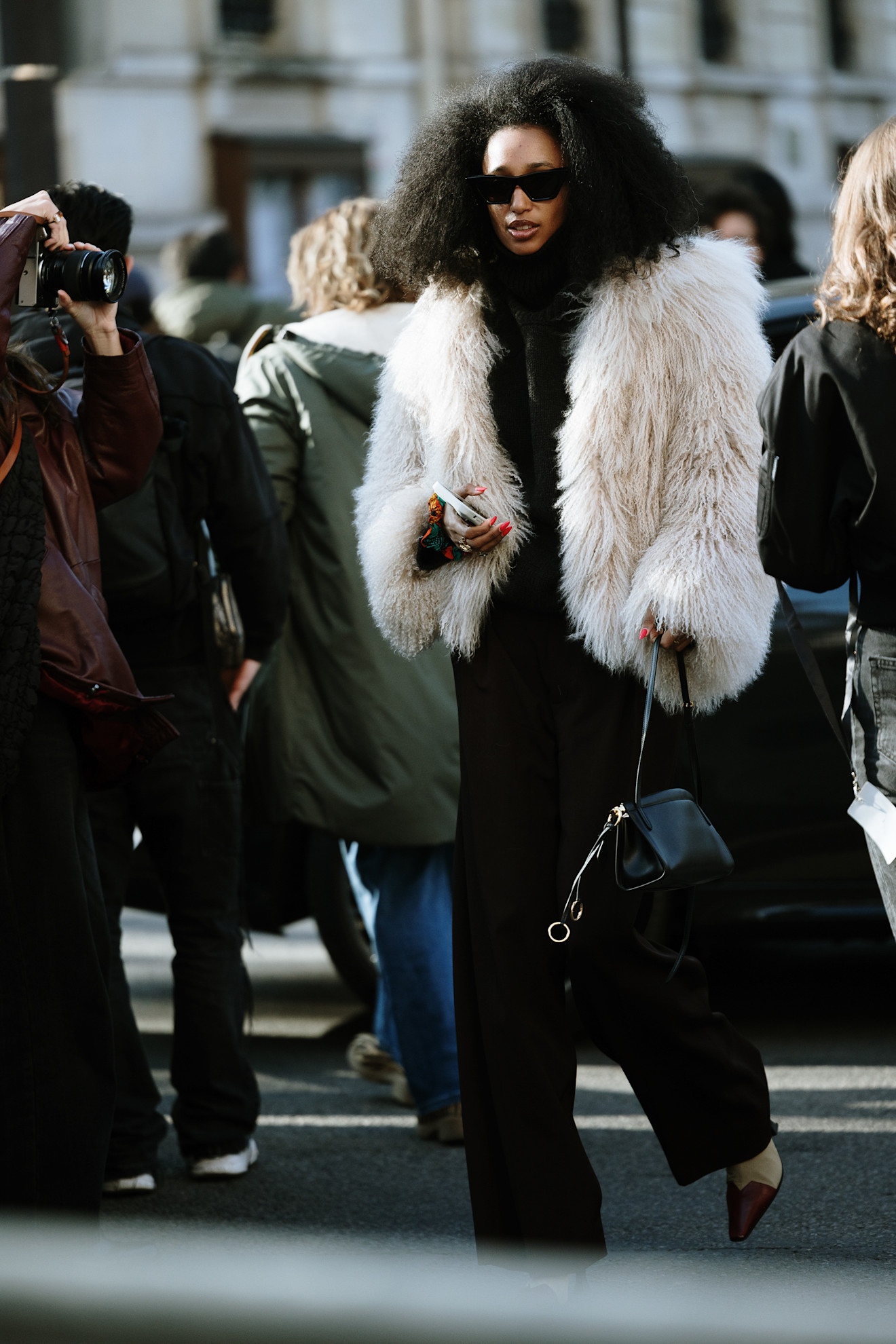 julia sarr-jamois wearing a mongolian shearling coat