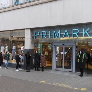 primark store with glass door and people