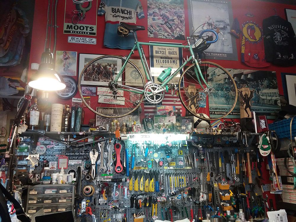 The walls at Vecchio's Bicicletteria are decorated with jerseys, bikes and posters from cycling's rich and diverse history