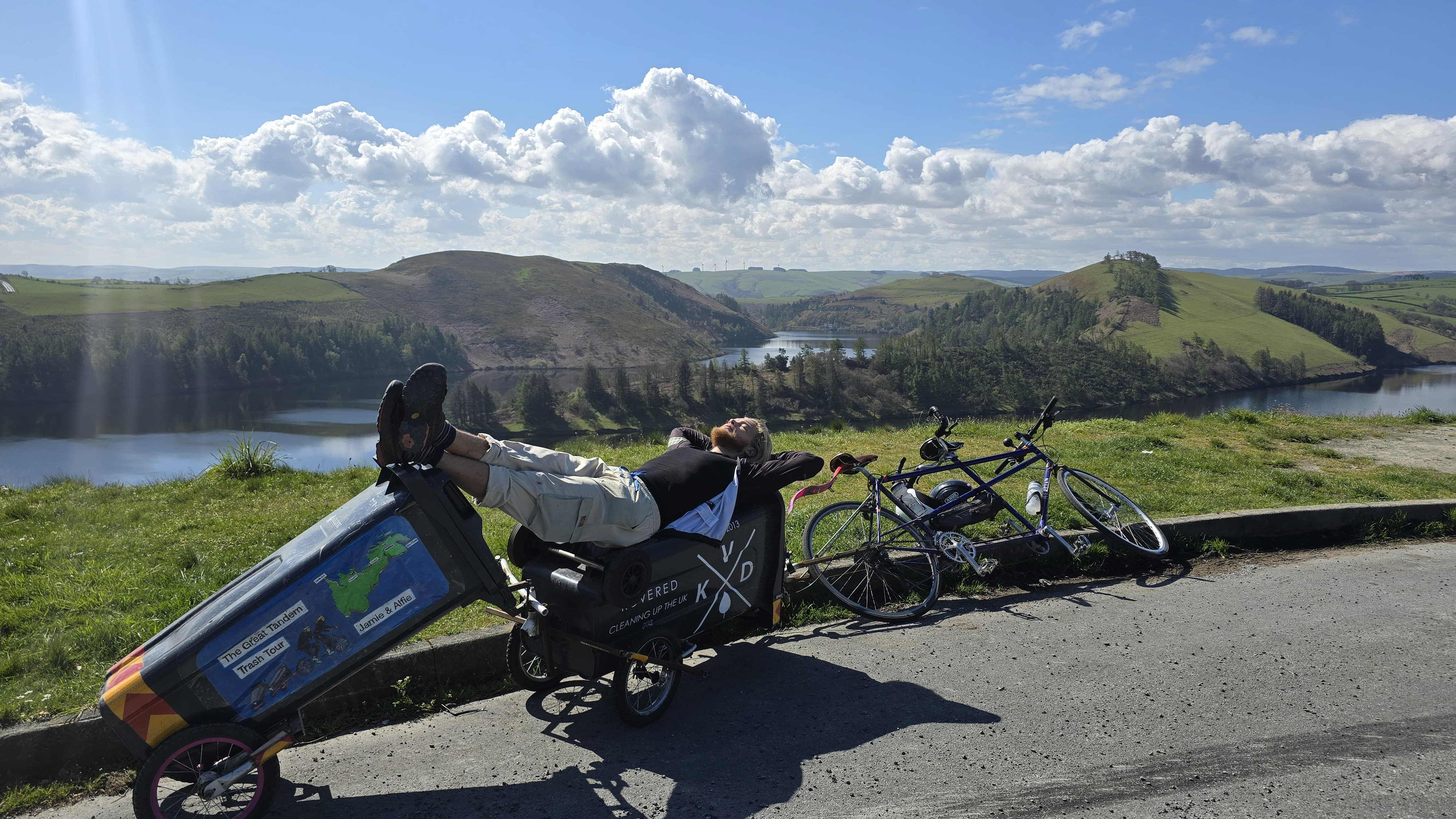 Jamie Hargreaves reclines on one of the bins