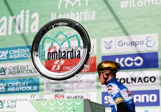 BERGAMO ITALY OCTOBER 12 Trophy detailed view and Remco Evenepoel of Belgium and Team Soudal QuickStep prior to the 118th Il Lombardia 2024 a 255km one day race from Bergamo to Como on October 12 2024 in Bergamo Italy Photo by Tim de WaeleGetty Images