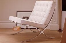 mies van der rohe's barcelona chair in white