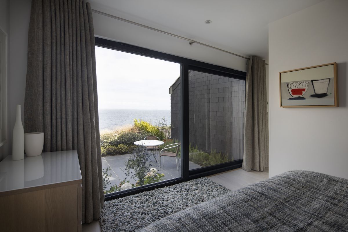 bedroom with sliding doors to patio area
