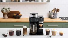 Ninja Espresso & Coffee Barista System in modern traditional kitchen with green cabinetry