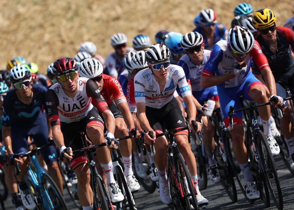 UAE Team Emirates teams Slovenian rider Tadej Pogacar wearing the best young riders white jersey cycles during the 13th stage of the 109th edition of the Tour de France cycling race 1926 km between Le Bourg dOisans in the French Alps and SaintEtienne in central France on July 15 2022 Photo by Thomas SAMSON AFP Photo by THOMAS SAMSONAFP via Getty Images