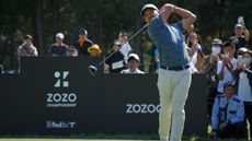 Xander Schauffele takes a shot during the Zozo Championship