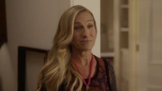 Carrie smiling while bantering with Duncan in And Just Like That Season 3