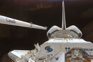 Shuttle Crew to Scan Heat Shield, Deploy Satellites