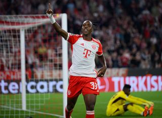 Mathys Tel of Bayern Munich celebrates after scoring their sides fourth goal during the UEFA Champions League match between FC Bayern München and Manchester United at Allianz Arena on September 20, 2023 in Munich, Germany.