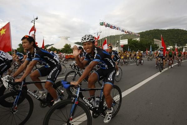 Giant Asia Racing Team's riders roll toward the start.