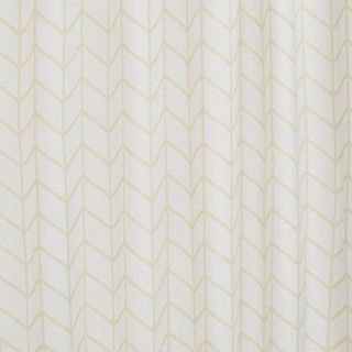 A white herringbone patterned shower curtain